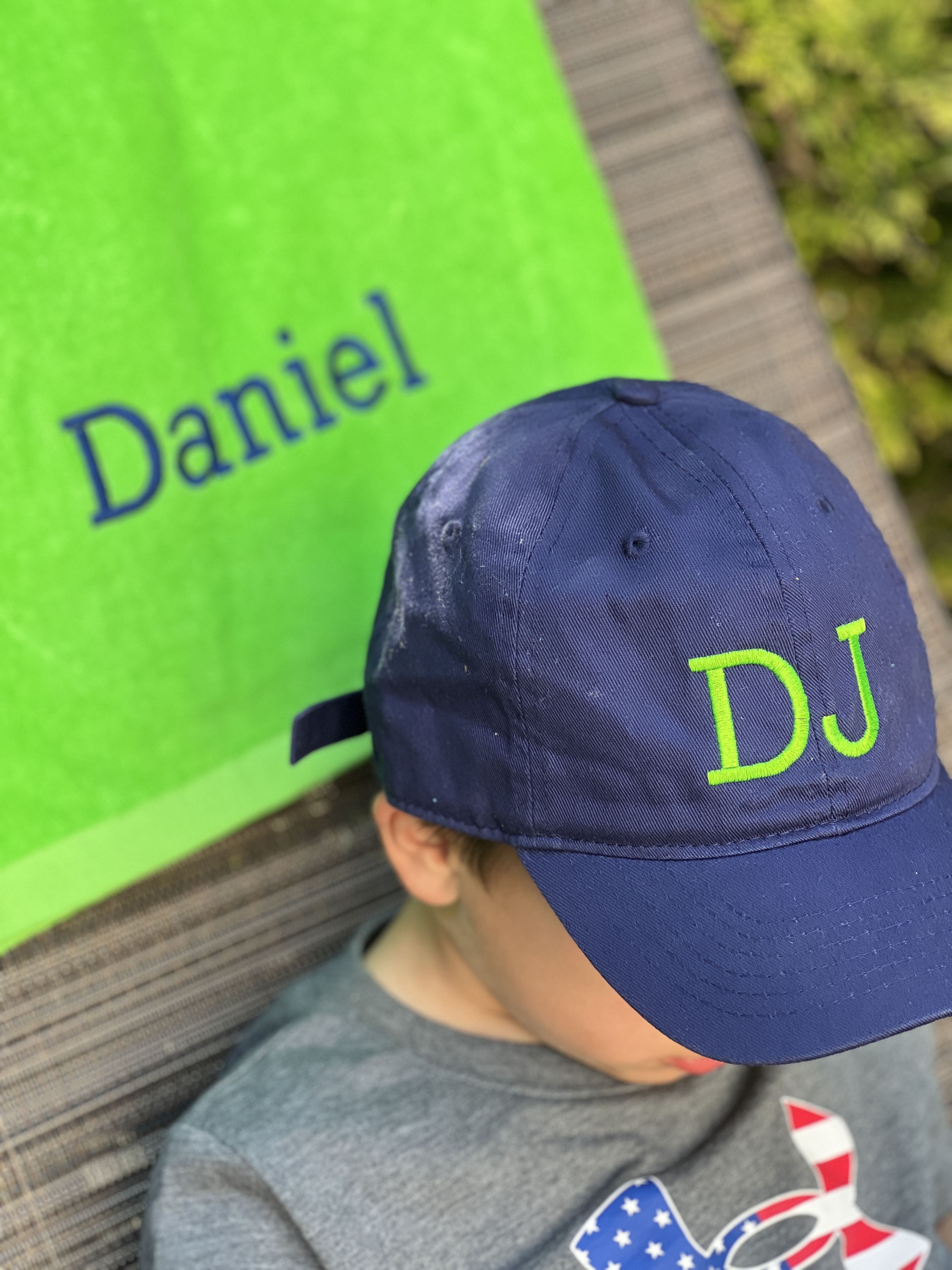 Lime towel and navy cap by wicked Stitches